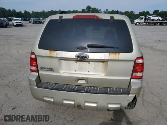 2011 Ford Escape XLT с VIN 1FMCU9D73BKC03125, выставлен на аукционе Copart как лот 65629545 с пробегом 182 633 миль миль и Списание • Salvage title. История ставок и продаж доступна на DreamBid. Изображение 6.