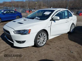 2011 Mitsubishi Lancer GTS with VIN JA32U8FW3BU030708, listed as a IAAI auction lot 41826170 with 213,889 mi miles. Bid and sale history available at carsss.com. Image 17.