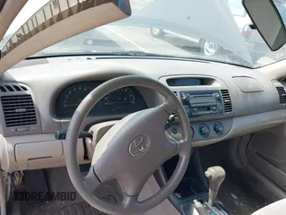 2003 Toyota Camry LE with VIN 4T1BE32K13U243738, listed as a IAAI auction lot 42120647 with Not Provided miles and . Bid and sale history available at DreamBid. Image 7.