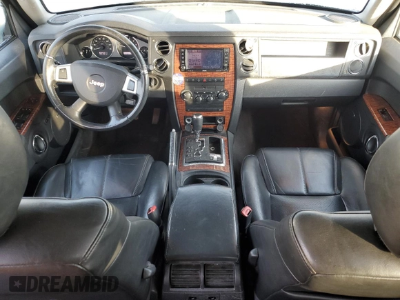 2010 Jeep Commander Limited with VIN 1J4RG5GT6AC113462, listed as a Copart auction lot 82400044 with 189,168 mi miles and Salvage title. Bid and sale history available at DreamBid. Image 8.