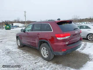 2018 Jeep Grand Cherokee Laredo E with VIN 1C4RJFAG9JC504596, listed as a IAAI auction lot 41595149 with 93,713 mi miles. Bid and sale history available at carsss.com. Image 3.