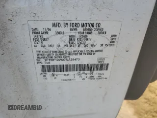 2007 Ford F-150 XL with VIN 1FTRF12W27NA28473, listed as a Copart auction lot 87459744 with Not Provided miles and Salvage Title. Bid and sale history available at carsss.com. Image 12.