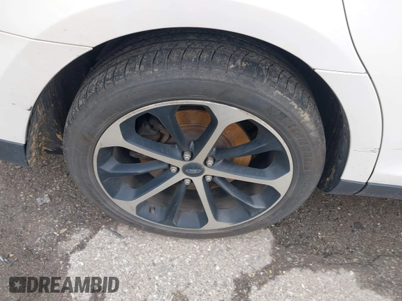 2014 Ford Taurus SHO with VIN 1FAHP2KT9EG107862, listed as a IAAI auction lot 42266313 with Not provided miles and . Bid and sale history available at DreamBid. Image 12.