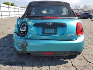 2019 MINI Convertible Cooper z VIN WMWWG5C50K3F79700, wystawiony jako Copart lot #45647955 z przebiegiem 65 168 mil mil oraz Szkoda całkowita • Salvage title. Historia ofert i sprzedaży dostępna na DreamBid. Obrazek 6.
