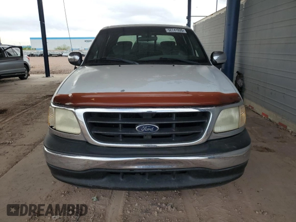 2001 Ford F-150 XLT с VIN 1FTRW07L01KA04562, выставлен на аукционе Copart как лот 52741935 с пробегом 288 598 миль миль и Списание • Salvage title. История ставок и продаж доступна на DreamBid. Изображение 5.