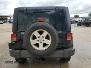 2012 Jeep Wrangler Unlimited Sport z VIN 1C4BJWDG3CL181596, wystawiony jako Copart lot #57940655 z przebiegiem 168 882 mil mil oraz Czysty tytuł • Clean title. Historia ofert i sprzedaży dostępna na DreamBid. Obrazek 6.