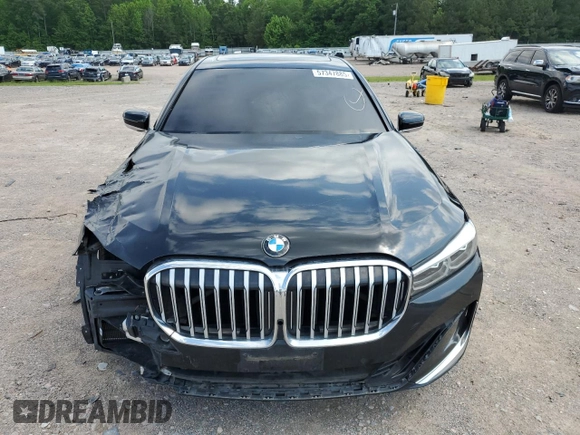 2020 BMW 7 Series 740i z VIN WBA7T2C06LGL17660, wystawiony jako Copart lot #57347885 z przebiegiem Nie podano mil oraz Tytuł czysty. Historia ofert i sprzedaży dostępna na DreamBid. Obrazek 5.