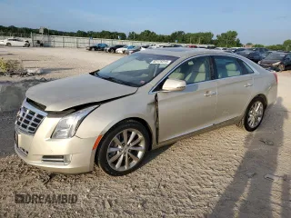 2013 Cadillac XTS Luxury with VIN 2G61P5S38D9191816, listed as a Copart auction lot 62175015 with 82,876 mi miles and Salvage title. Bid and sale history available at DreamBid. Image 1.