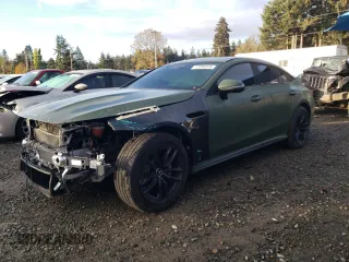 2022 Mercedes-Benz AMG GT with VIN W1K7X5KB9NA048223, listed as a Copart auction lot 77485974 with 14,457 mi miles and Salvage Title. Bid and sale history available at carsss.com. Image 1.