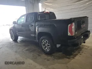 2021 GMC Canyon 4WD AT4 w/Leather with VIN 1GTG6FEN8M1255144, listed as a Copart auction lot 50186815 with 43,610 mi miles and Salvage Title. Bid and sale history available at carsss.com. Image 2.
