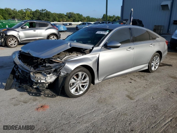 2019 Honda Accord Sedan LX 1.5T with VIN 1HGCV1F10KA129326, listed as a Copart auction lot 51671205 with 69,687 mi miles and Salvage Title. Bid and sale history available at carsss.com. Image 1.