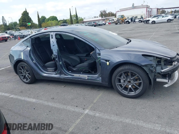2023 Tesla Model 3 with VIN 5YJ3E1EA4PF410060, listed as a IAAI auction lot 42067624 with 59,934 mi miles and . Bid and sale history available at DreamBid. Image 19.