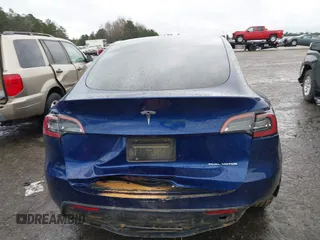 2023 Tesla Model Y Long Range with VIN 7SAYGDEE7PF673988, listed as a IAAI auction lot 41057651 with 29,683 mi miles and . Bid and sale history available at DreamBid. Image 15.