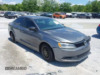 2014 Volkswagen Jetta S z VIN 3VW2K7AJ6EM253571, wystawiony jako IAAI lot #42186222 z przebiegiem 171 518 mil mil oraz . Historia ofert i sprzedaży dostępna na DreamBid. Obrazek 1.