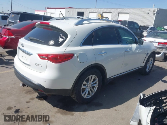 2014 Infiniti QX70 with VIN JN8CS1MW7EM413033, listed as a IAAI auction lot 41993136 with 148,838 mi miles and . Bid and sale history available at DreamBid. Image 4.