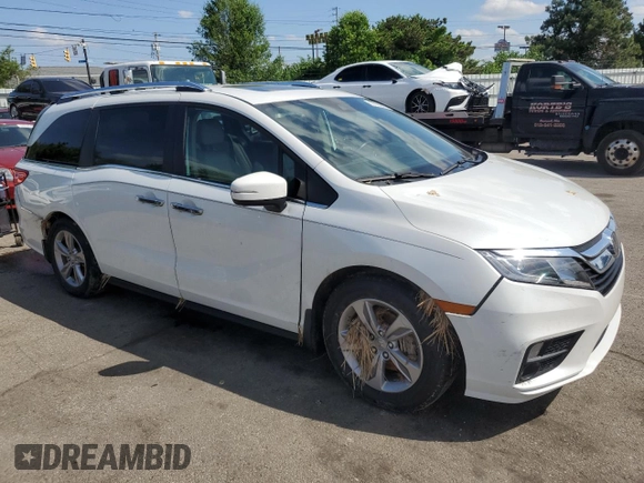 2020 Honda Odyssey EX-L z VIN 5FNRL6H79LB040523, wystawiony jako Copart lot #57383005 z przebiegiem 105 754 mil mil oraz Szkoda całkowita • Salvage title. Historia ofert i sprzedaży dostępna na DreamBid. Obrazek 4.