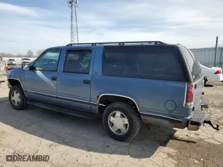 1997 GMC Suburban with VIN 1GKFK16R7VJ707618, listed as a Copart auction lot 49882035 with 317,771 mi miles and Salvage Title. Bid and sale history available at carsss.com. Image 2.
