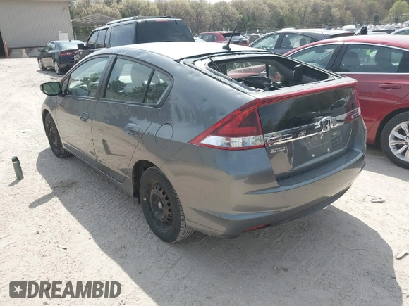 2012 Honda Insight LX with VIN JHMZE2H54CS004239, listed as a IAAI auction lot 42197049 with 113,350 mi miles and . Bid and sale history available at DreamBid. Image 3.