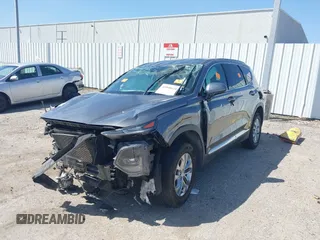 2019 Hyundai Santa Fe SEL with VIN 5NMS33AD3KH134264, listed as a IAAI auction lot 41848618 with Not Provided miles and . Bid and sale history available at DreamBid. Image 2.