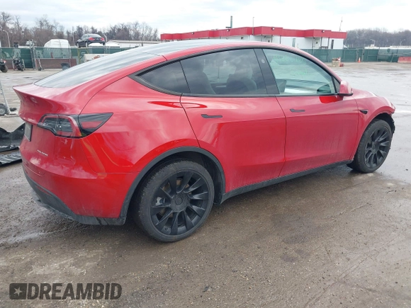2023 Tesla Model Y Long Range with VIN 7SAYGDEE1PA169031, listed as a IAAI auction lot 41660766 with 35,253 mi miles and . Bid and sale history available at DreamBid. Image 4.
