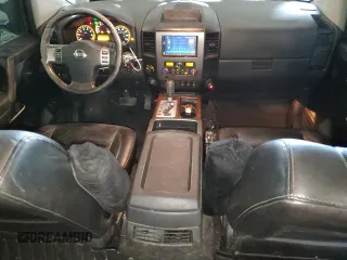 2011 Nissan Titan Pro-4X with VIN 1N6AA0EC5BN307980, listed as a Copart auction lot 42000295 with 168,335 mi miles and Salvage title. Bid and sale history available at DreamBid. Image 8.