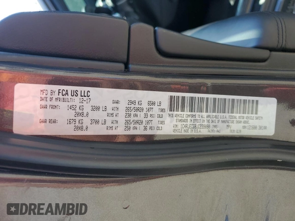2018 Jeep Grand Cherokee High Altitude with VIN 1C4RJECG8JC239080, listed as a Copart auction lot 62141205 with 66,126 mi miles and Salvage title. Bid and sale history available at DreamBid. Image 14.