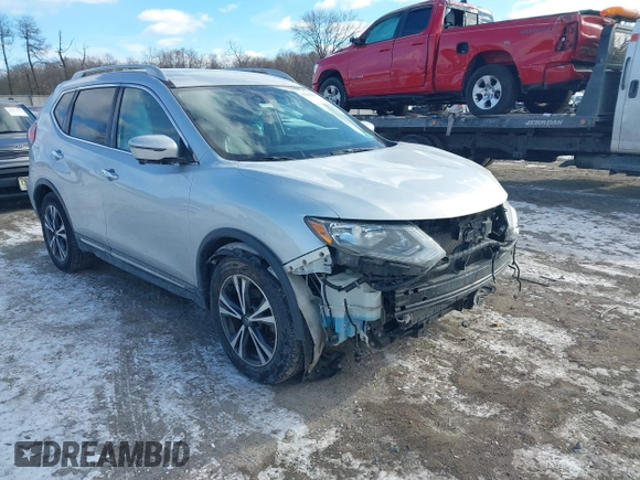 2018 Nissan Rogue S with VIN 5N1AT2MT2JC738034, listed as a IAAI auction lot 41286839 with 125,037 mi miles and . Bid and sale history available at DreamBid. Image 1.