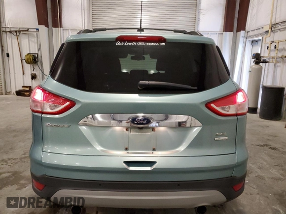 2013 Ford Escape SEL with VIN 1FMCU9H93DUA72099, listed as a Copart auction lot 58691955 with 30,449 mi miles and Salvage title. Bid and sale history available at DreamBid. Image 6.