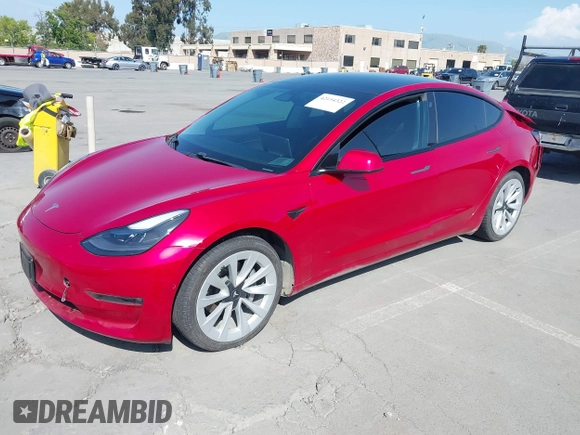2021 Tesla Model 3 Long Range with VIN 5YJ3E1EB4MF936743, listed as a IAAI auction lot 42154322 with 46,983 mi miles and . Bid and sale history available at DreamBid. Image 2.