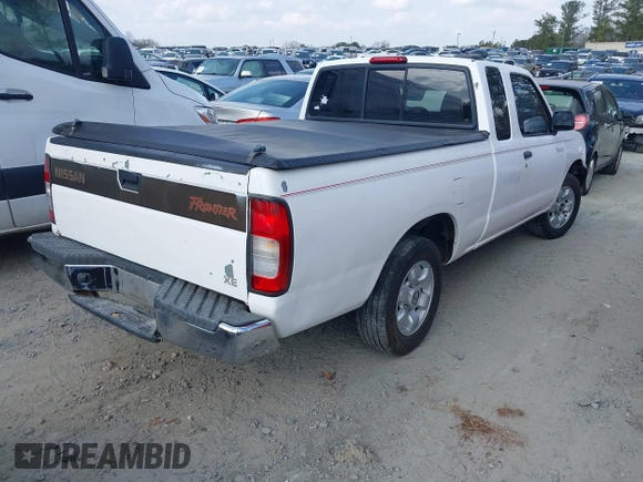 1999 Nissan Frontier XE with VIN 1N6DD26SXXC324508, listed as a IAAI auction lot 41521674 with 297,239 mi miles and . Bid and sale history available at DreamBid. Image 4.