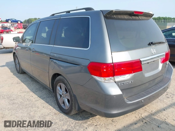 2008 Honda Odyssey Touring z VIN 5FNRL38978B047803, wystawiony jako IAAI lot #42427855 z przebiegiem 125 697 mil mil oraz . Historia ofert i sprzedaży dostępna na DreamBid. Obrazek 3.