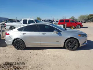 2018 Ford Fusion Energi SE with VIN 3FA6P0PU4JR123581, listed as a IAAI auction lot 41134246 with 226,813 mi miles. Bid and sale history available at carsss.com. Image 13.