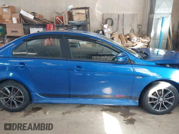 2017 Mitsubishi Lancer ES with VIN JA32V2FW4HU006890, listed as a IAAI auction lot 41636035 with 165,077 mi miles. Bid and sale history available at carsss.com. Image 13.