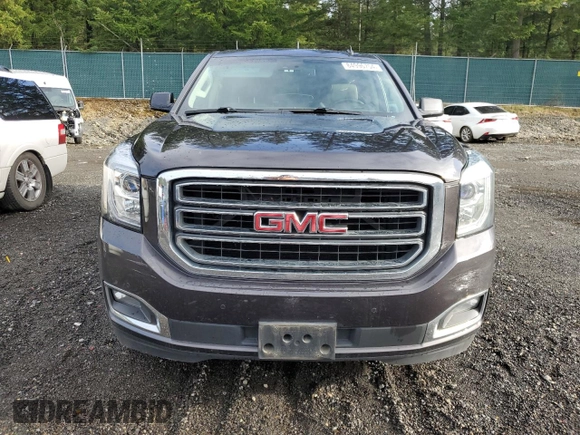 2015 GMC Yukon XL SLT with VIN 1GKS2HKC7FR282543, listed as a Copart auction lot 84996754 with 153,840 mi miles and Clean Title. Bid and sale history available at carsss.com. Image 5.