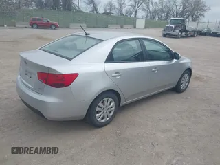 2012 Kia Forte EX with VIN KNAFU4A25C5591601, listed as a IAAI auction lot 42071351 with 120,636 mi miles. Bid and sale history available at carsss.com. Image 4.