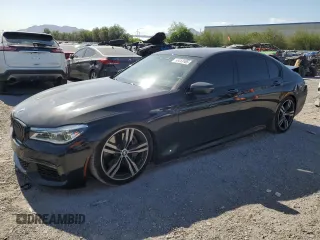 2017 BMW 7 Series 750i with VIN WBA7F0C59HGM21302, listed as a Copart auction lot 58413185 with 56,605 mi miles and Salvage title. Bid and sale history available at DreamBid. Image 1.