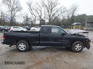 1997 Dodge Dakota with VIN 1B7GL23X2VS209651, listed as a IAAI auction lot 41421859 with 246,016 mi miles. Bid and sale history available at carsss.com. Image 13.
