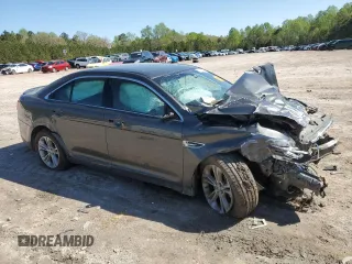 2016 Ford Taurus SEL with VIN 1FAHP2E87GG137713, listed as a Copart auction lot 52519035 with 134,227 mi miles and Salvage Title. Bid and sale history available at DreamBid. Image 4.