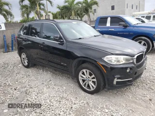 2015 BMW X5 sDrive35i with VIN 5UXKR2C57F0H37742, listed as a Copart auction lot 47573415 with 142,259 mi miles and Clean Title. Bid and sale history available at carsss.com. Image 4.