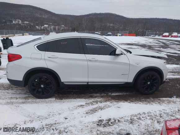 2018 BMW X4 xDrive28i with VIN 5UXXW3C5XJ0T82043, listed as a IAAI auction lot 41246495 with 106,606 mi miles. Bid and sale history available at carsss.com. Image 13.