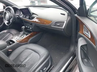 2016 Audi A6 2.0T Premium Plus with VIN WAUGFAFC6GN055826, listed as a IAAI auction lot 42011778 with 98,210 mi miles. Bid and sale history available at carsss.com. Image 5.