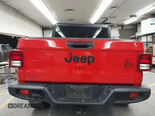 2022 Jeep Gladiator Altitude z VIN 1C6HJTAGXNL117353, wystawiony jako IAAI lot #42427921 z przebiegiem 28 801 mil mil oraz . Historia ofert i sprzedaży dostępna na DreamBid. Obrazek 16.