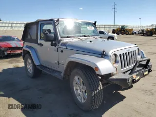 2015 Jeep Wrangler Sahara с VIN 1C4AJWBG1FL742588, выставлен на аукционе Copart как лот 72400274 с пробегом 139 520 миль миль и Списание • Salvage title. История ставок и продаж доступна на DreamBid. Изображение 4.