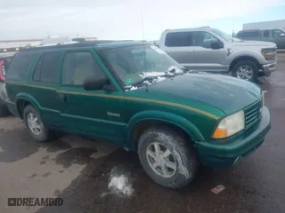 1999 Oldsmobile Bravada with VIN 1GHDT13W7X2711363, listed as a IAAI auction lot 41294782 with 198,508 mi miles. Bid and sale history available at carsss.com. Image 1.