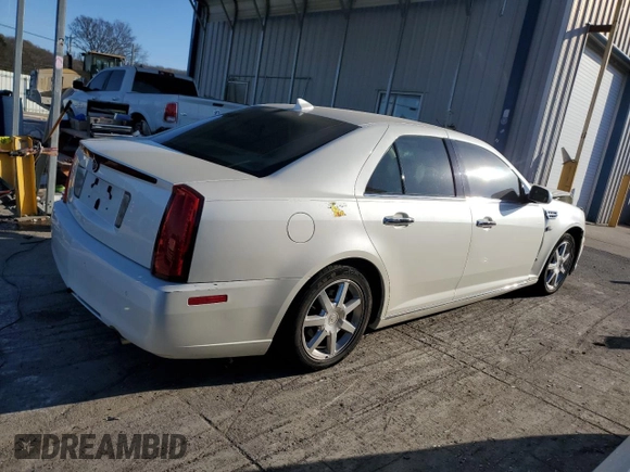 2010 Cadillac STS AWD z VIN 1G6DU6EV0A0101850, wystawiony jako Copart lot #83113264 z przebiegiem 103 491 mil mil oraz Szkoda całkowita • Salvage title. Historia ofert i sprzedaży dostępna na DreamBid. Obrazek 3.