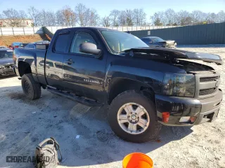 2010 Chevrolet Silverado 1500 LT with VIN 1GCSKSE30AZ269694, listed as a Copart auction lot 87296874 with 116,556 mi miles and Salvage Title. Bid and sale history available at carsss.com. Image 4.