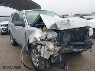 2011 Mazda Tribute Sport with VIN 4F2CY9C7XBKM01050, listed as a IAAI auction lot 41433870 with 122,287 mi miles. Bid and sale history available at carsss.com. Image 6.