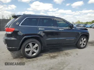 2014 Jeep Grand Cherokee Overland with VIN 1C4RJECG9EC173693, listed as a Copart auction lot 53747045 with 73,234 mi miles and Non Repairable. Bid and sale history available at carsss.com. Image 3.