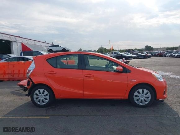 2014 Toyota Prius c One with VIN JTDKDTB32E1065438, listed as a IAAI auction lot 37350203 with 94,630 mi miles. Bid and sale history available at carsss.com. Image 14.