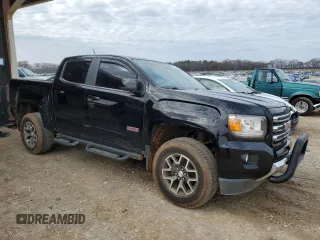 2015 GMC Canyon 4WD SLE with VIN 1GTG6BE38F1140912, listed as a Copart auction lot 44330565 with 102,809 mi miles and Salvage Title. Bid and sale history available at carsss.com. Image 4.